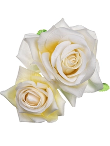 Detailed close-up of double realistic white and yellow velvet rose hair clips on white background
