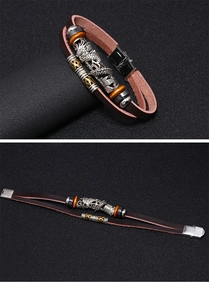 Macro detail of braided leather bracelet with silver dragon charm and steel magnetic clasp