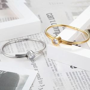 Classic stainless steel bangle with Roman numerals and cubic zirconia in gold and silver