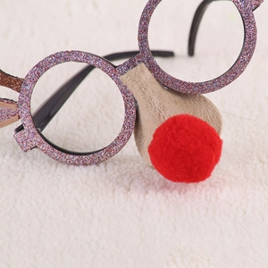 Close-up of glittery Christmas glasses with a plush red nose and sequin finish