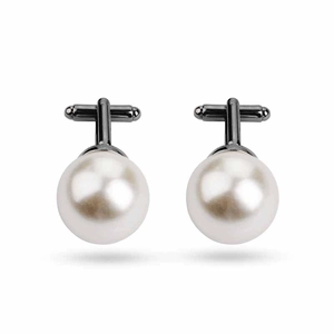 Macro detail of white pearl cufflinks with gunmetal base and T-swing bar mechanism
