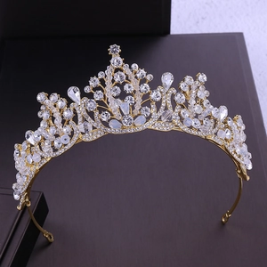 Detailed macro view of golden bridal crown with sparkling rhinestones and crystal beads
