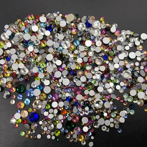Flatback rhinestones in various sizes and colors for nail art and DIY decoration