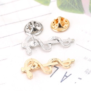 Caduceus medical symbol lapel pins in gold and silver finish with metal butterfly clutch