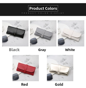 Detail of leather sunglasses cases with metal snap closures in five different colors