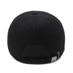 Back view of black corduroy baseball cap with adjustable metal buckle and thick fabric