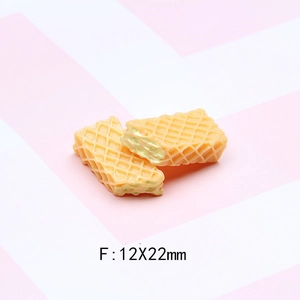 Macro shot of 12x22mm miniature waffle charms for DIY resin crafts and dollhouse food