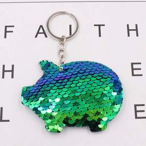 Cute pig sequin keychain with blue-green gradient flip sequins on a metal ring