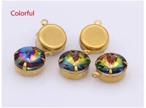 Macro shot of 5 multicolor round crystal pendants with gold claw settings for DIY jewelry