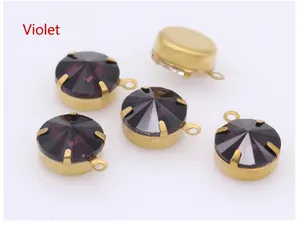Detailed view of 5 violet crystal glass pendants with gold claw settings for jewelry making