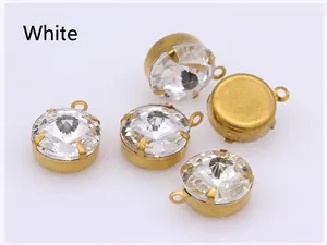 Macro detail of white crystal round glass pendant with gold claw setting for DIY jewelry