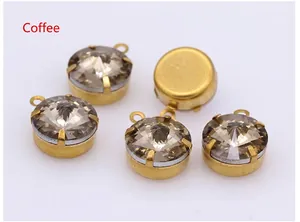 Detail of coffee brown crystal pendants with gold claw settings for DIY jewelry making