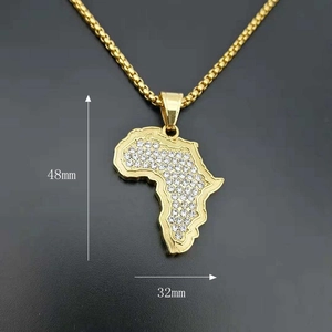 Macro shot of 48mm iced-out gold Africa map pendant necklace with size annotations