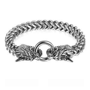 Detailed macro view of vintage dragon head clasp on double-woven titanium steel bracelet