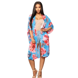 Women's blue floral print long cardigan paired with high waist denim shorts set