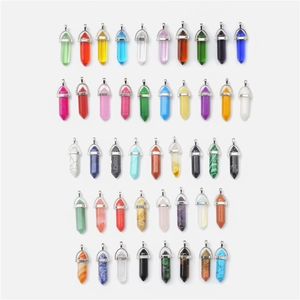 Variety of quartz point pendants in different natural stone colors and textures