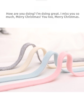 Close-up of wool felt colorful ribbons in macaron shades for DIY Christmas decorations