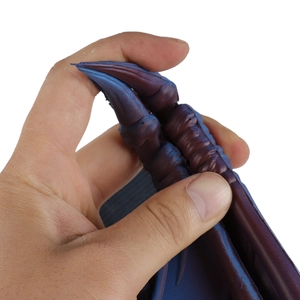 Detail of soft purple gradient dragon wings showing flexible rubber material and texture