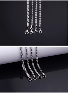Detail of silver twisted rope chains in various sizes with lobster clasps and extenders