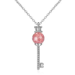 Romantic crown key pendant necklace with pink strawberry crystal and sparkling diamonds
