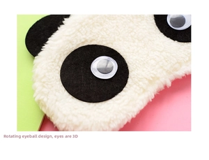 Dettaglio della maschera da notte panda con occhi 3D mobili e morbido tessuto peluche