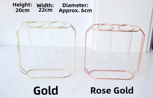 Detailed size chart for geometric metal frame test tube vases in gold and rose gold colors