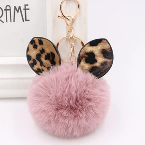Pink fluffy keychain with leopard print ears and gold metal clasp for bags