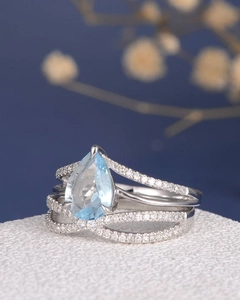 Elegant pear cut blue sapphire ring with multi-layer pave silver band for women