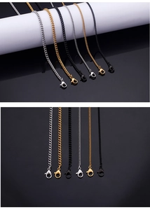 Detail of titanium steel necklaces in silver, gold, and black with lobster clasps