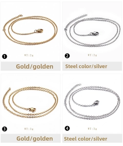 Detail view of 2mm stainless steel cable chains in gold and silver with lobster clasps