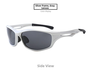 Side view of silver cycling sunglasses featuring hollowed-out frames and grey lenses