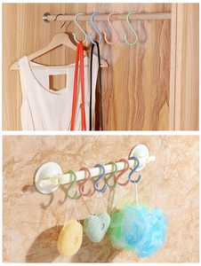 Versatile plastic S-hooks in pastel colors for organizing closets and bathrooms