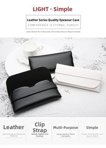 Close-up of leather glasses cases with strap closure in black and white minimalist style