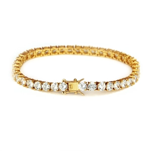 Detail of 5mm gold tennis bracelet showing micro-pave cubic zirconia and secure clasp