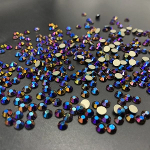 Macro shot of 12-grid dark blue rhinestones with silver flat back and faceted crystal surface