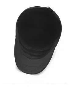 Internal view of black military flat top hat showing sweatband and stitching details