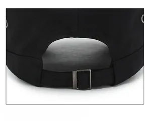 Detail of adjustable metal buckle and strap on the back of the black cotton army cap