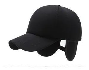 Side profile of a black corduroy winter baseball cap with ear flaps and SPORT logo