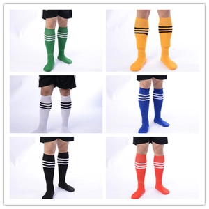 Detailed view of long football socks in green, yellow, white, blue, black, and red colors