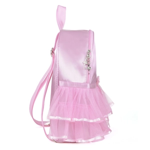 Detail of pink satin ballet backpack featuring tutu ruffles and silver ballerina charm