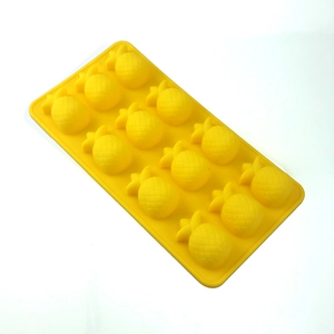 Yellow silicone ice tray mold featuring 12 pineapple shaped cavities for treats