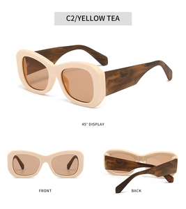 Detailed views of off-white cat-eye sunglasses with marble texture temples and yellow tea lenses