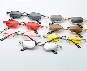 Close-up of retro rectangular metal sunglasses in seven vibrant color options