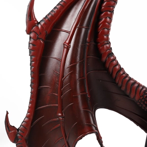 Detail showing the red and black gradient texture on kids dragon wings cosplay costume
