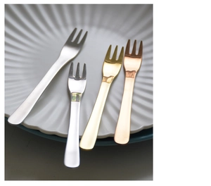 Detailed macro view of 304 stainless steel dessert forks in silver, gold and rose gold