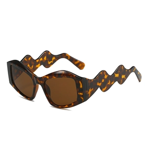 Irregular geometric tortoiseshell sunglasses with wavy temples in a stylish 45-degree view