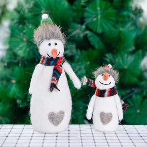 Set of two wool felt snowman dolls with scarves and hats for Christmas home decoration
