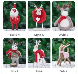 Collection of handmade Christmas felt dolls including reindeer and Santa figures