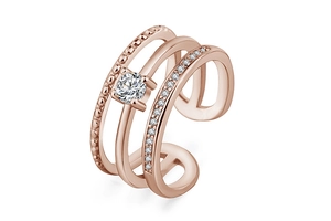 Detail of rose gold triple-layer adjustable ring featuring sparkling center diamond and accents