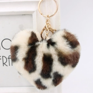 Chic leopard print heart faux fur keychain with gold ring and lobster clasp on white frame